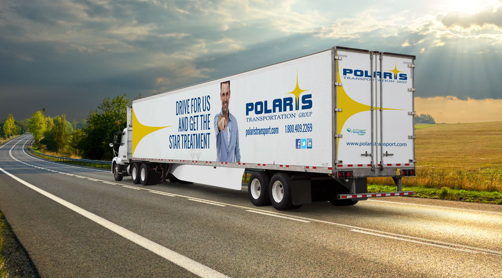 Three Polaris transport trucks and trailers parked beside each other