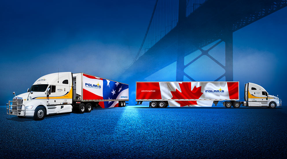 Polaris transport trucks with USA and Canada flag wraps