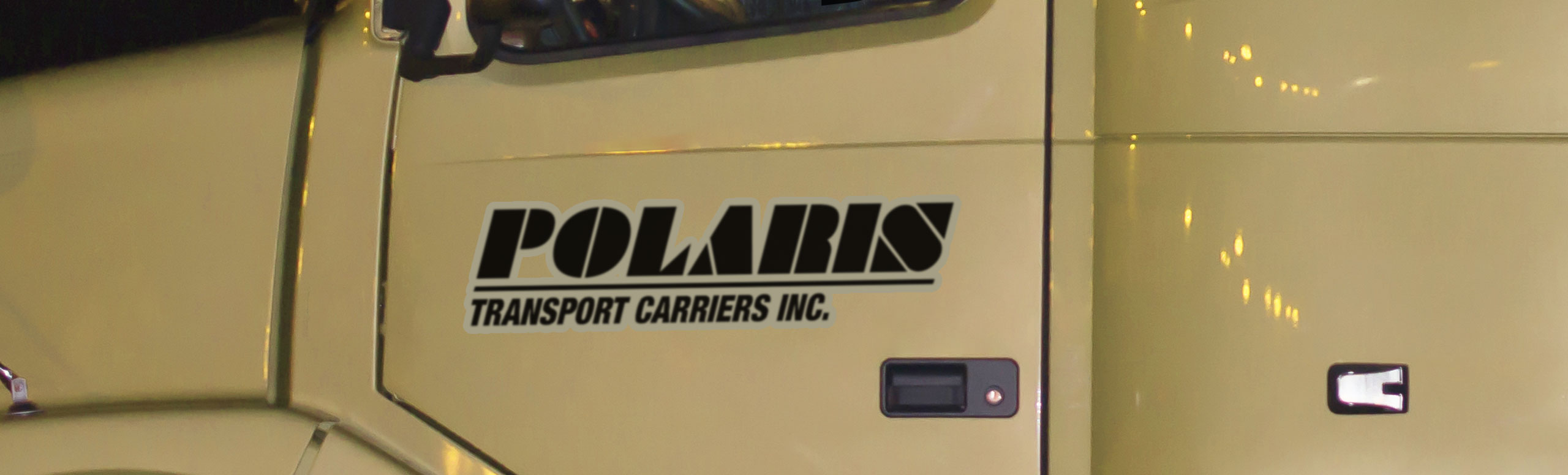Closeup of vintage Polaris Transport Carriers Inc. truck side door 